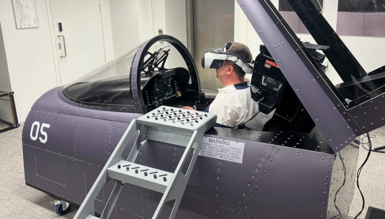 a person sitting in a VR cockpit, wearing an XR headset