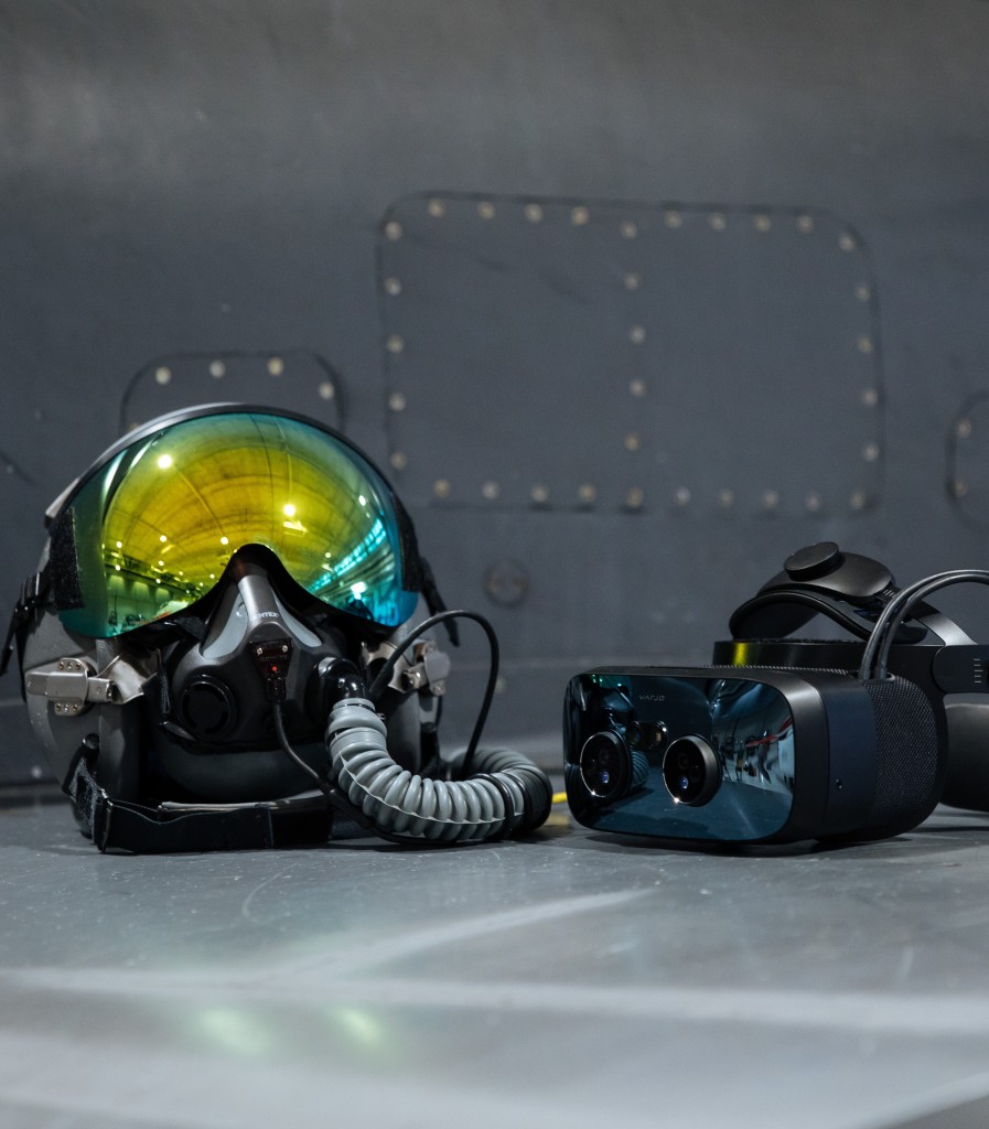 A pilot helmet and a VR headset