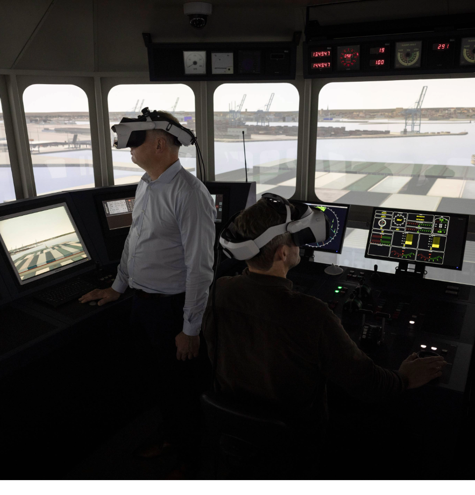 two people on a simulated ship bridge wearing XR headsets