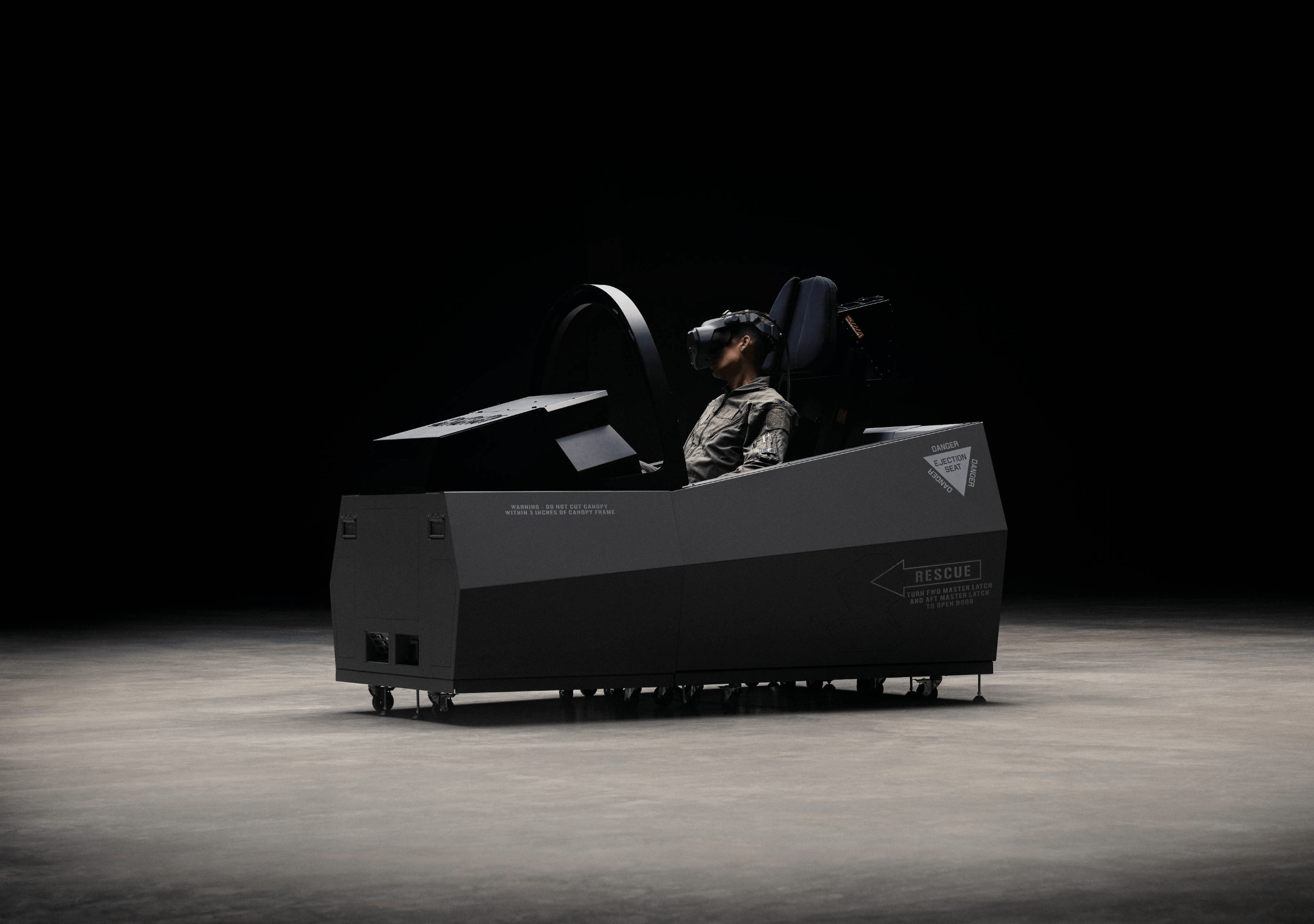 A person sitting in a flight simulator