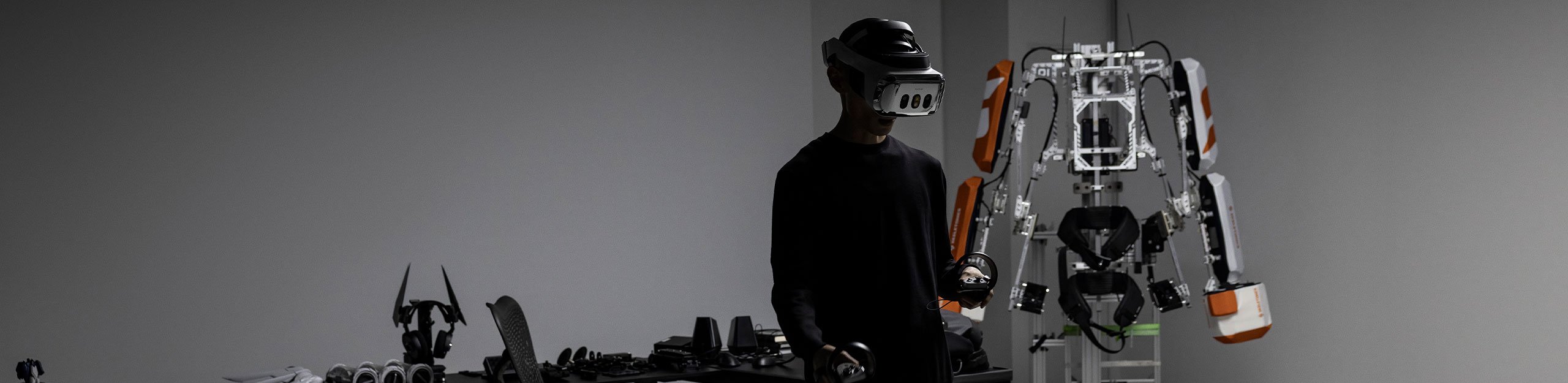 A person in a VR lab using a mixed reality headset